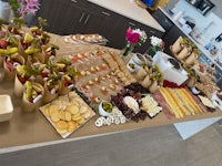 a long table with a variety of food on it